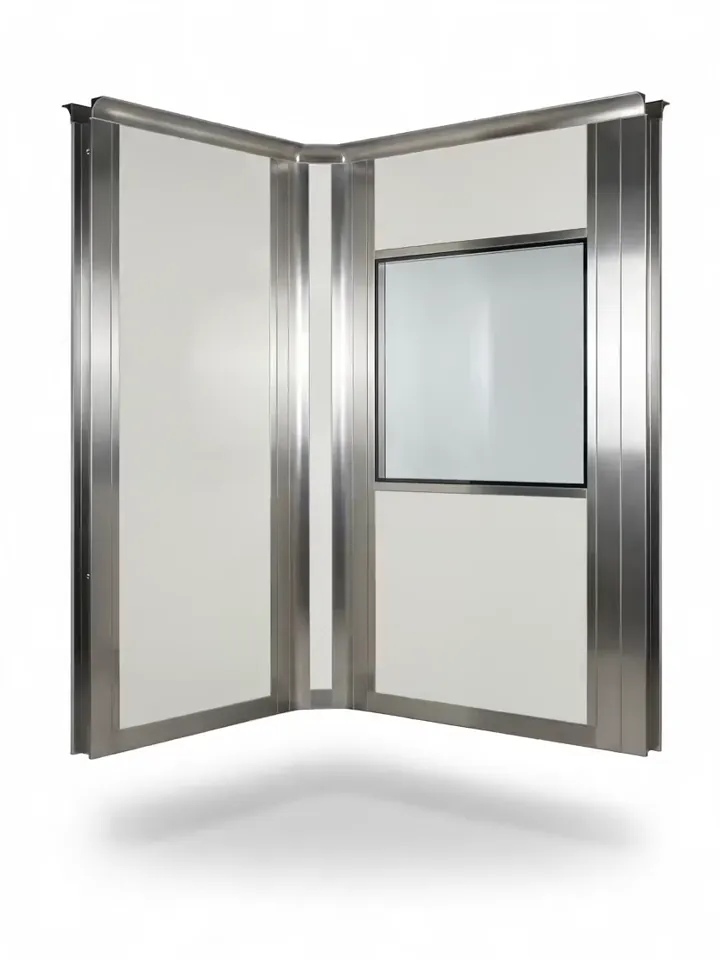 Modular cleanroom panel corner with a flush glazed view window, concealed vertical joint and integral coving
