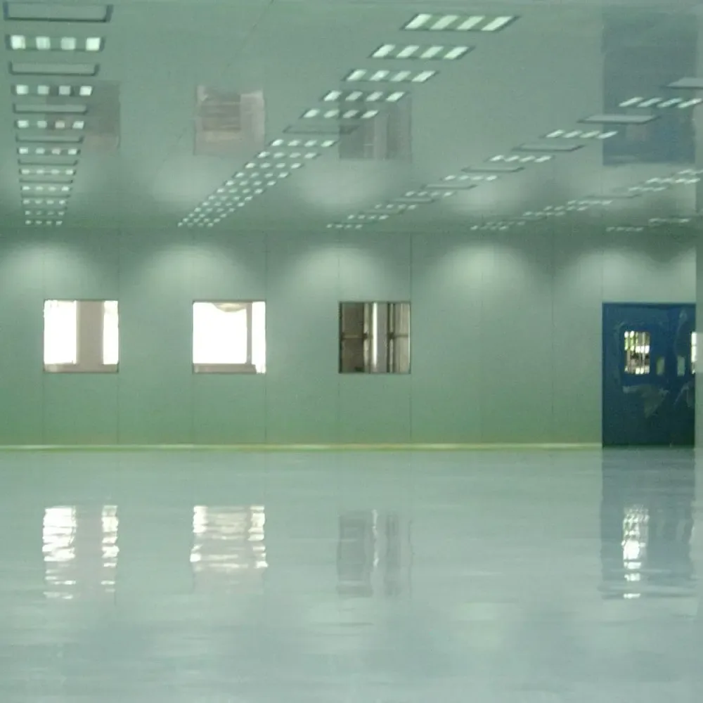 Cleanroom hall with vision panels along the partition and a high-gloss floor