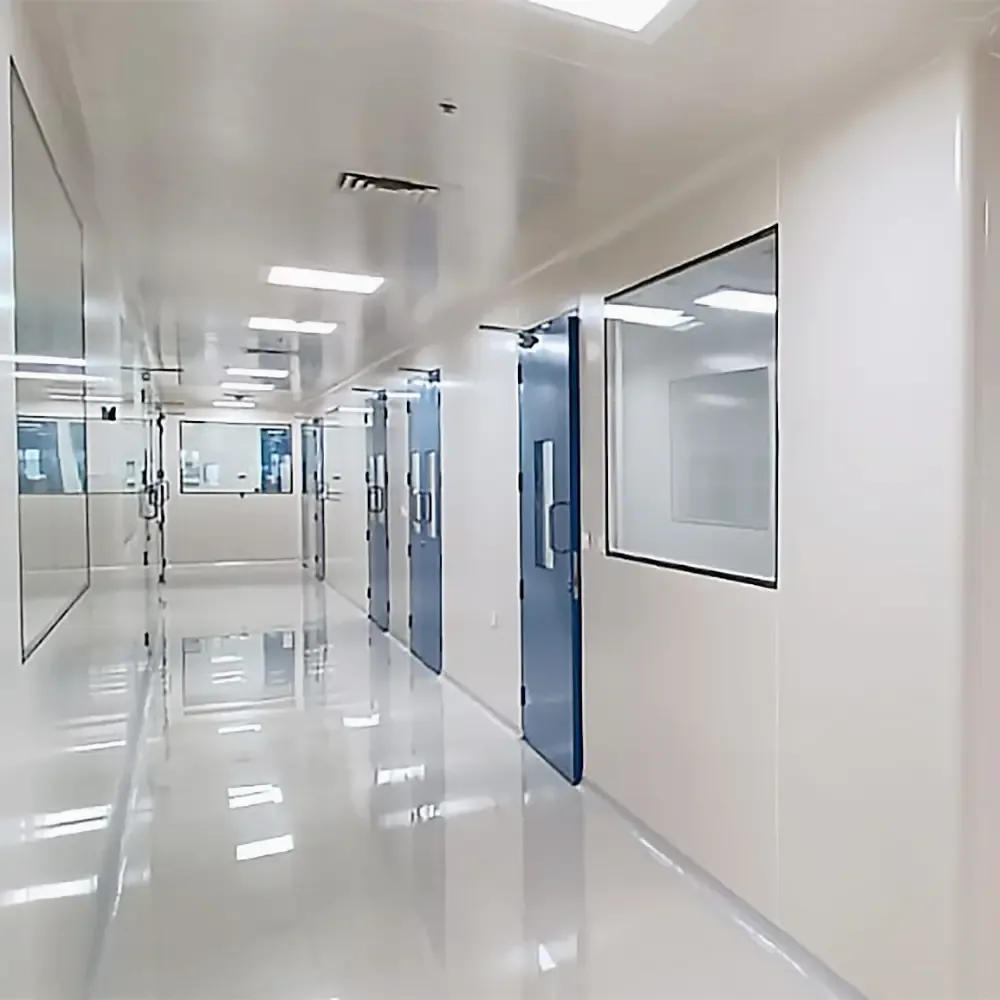 Double-leaf cleanroom door set with vision panels in a panelled partition