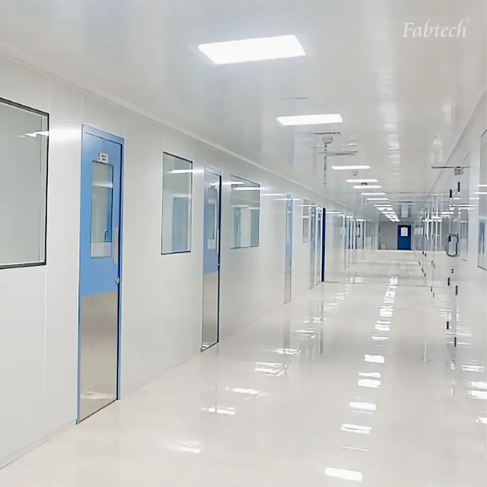 Long production corridor with flush wall panels and recessed lighting