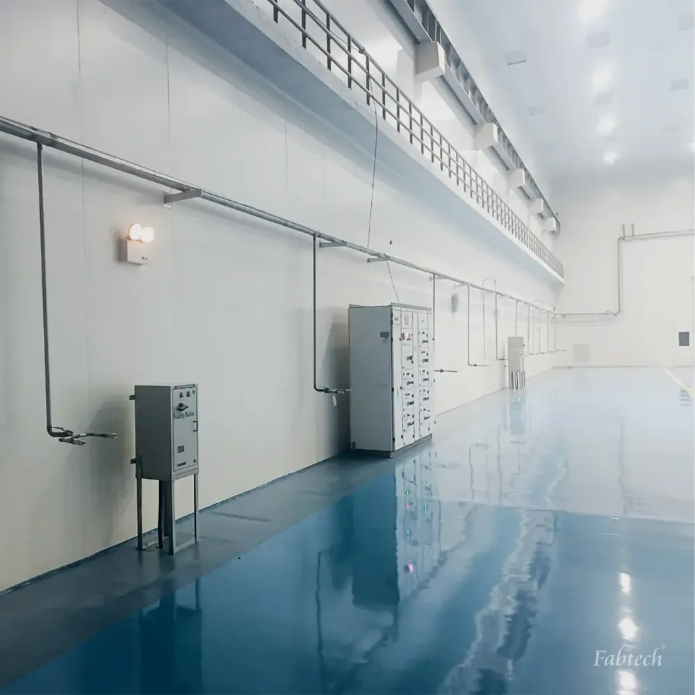 Wall-mounted electrical enclosures against flush cleanroom panelling